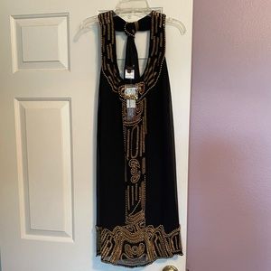 Single brand,  never been worn, size 8 beaded dress.